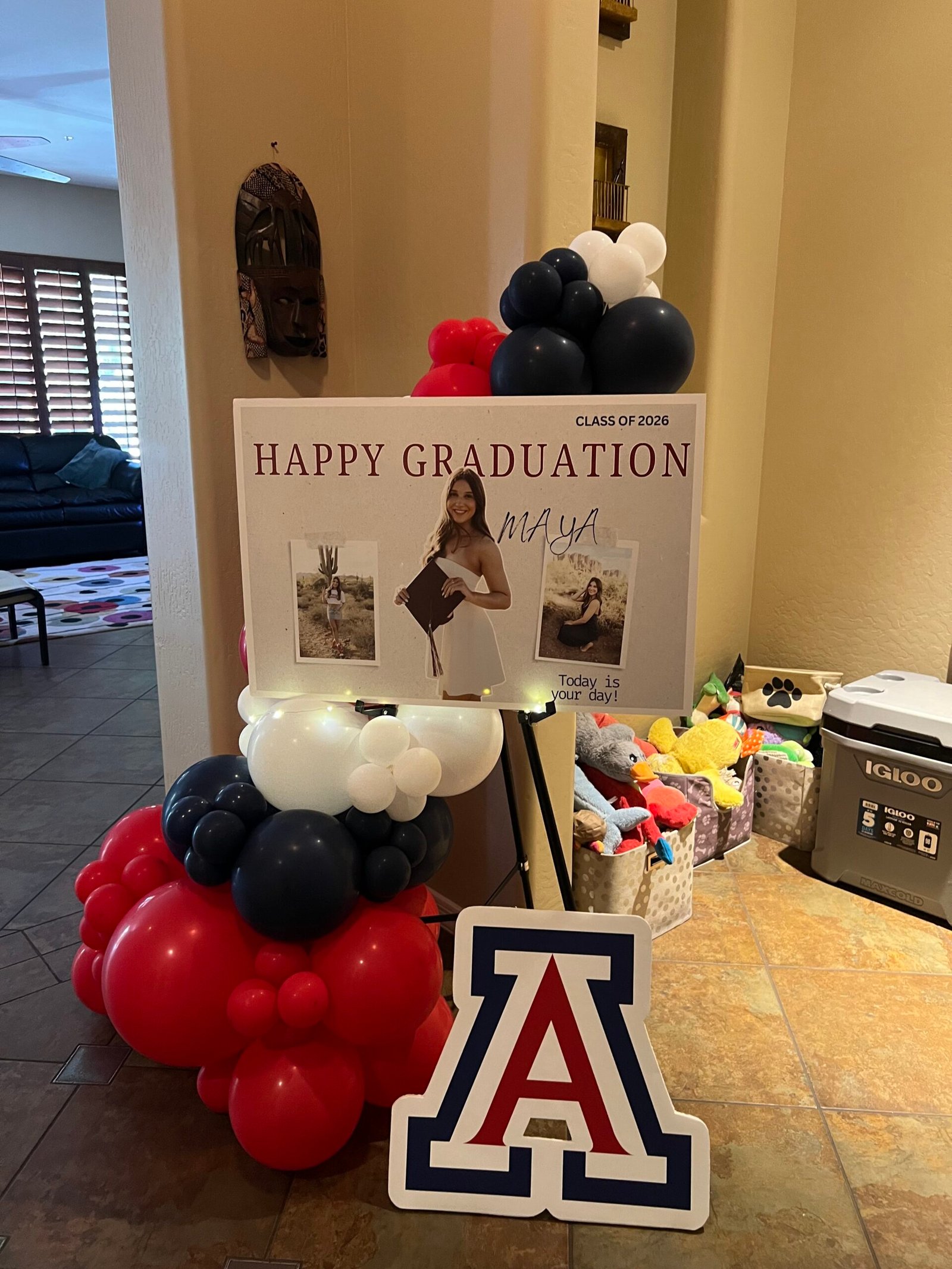 Personalized graduation display with red, black and ivory balloons